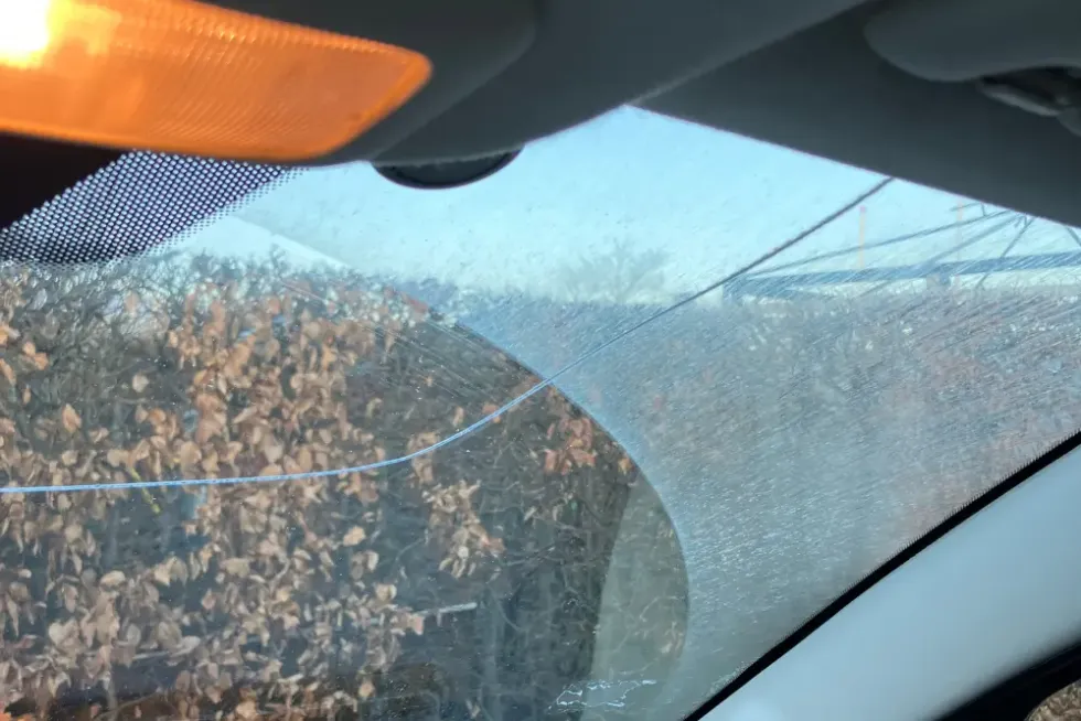 Cracked car windscreen viewed from inside the cabin